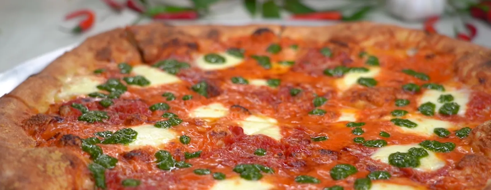 Tri Color pizza on a pan at Pizzeria Maki