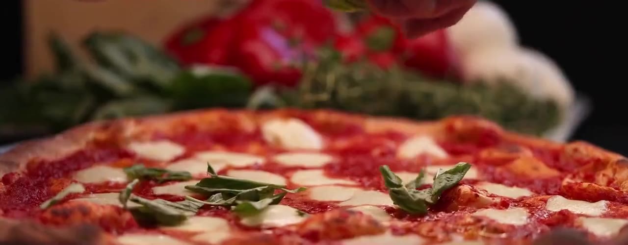 Pizza and sushi being made at Pizzeria Maki