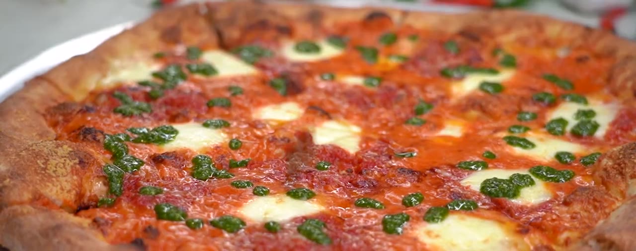 Tri Color pizza with tomato, vodka sauce and pesto